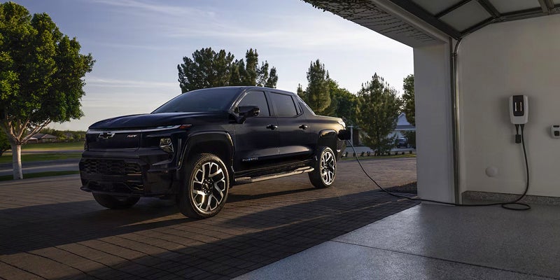 A 2022 Chevrolet Silverado EV at a charging station